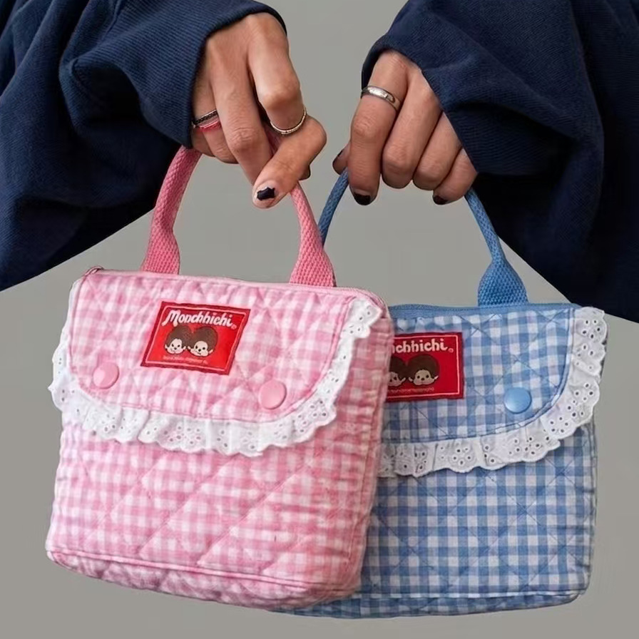 Vintage Item - Tas makeup genggam bergaya vintage dengan
